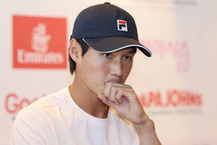 นักเทนนิสชาวเกาหลี ควอน ซุน-วู มองลึกลงไปในดินบ้านเกิด